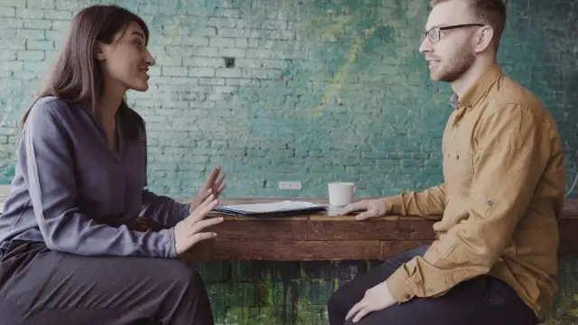 Header image with background of a girl interviewing a boy