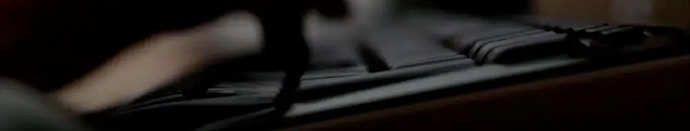 Imagen de teclado, enfocado lateralmente y algo desenfocado